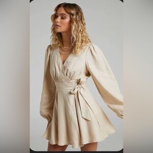 NWT Showpo. Amalie the label “Zuri” Cream Puffed Long Sleeve Wrap Dress